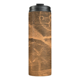 antikes Design an der Höhlenwand. Antiquitätengesc Thermosbecher