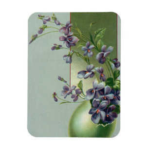 Antikes Osterei mit blühenden violetten Blumen Magnet