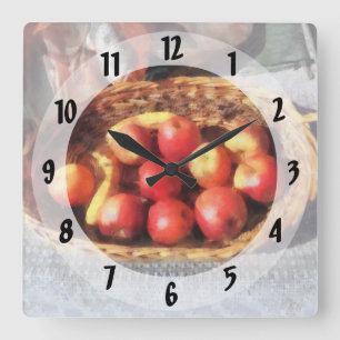 Äpfel und Bananen im Korb Quadratische Wanduhr
