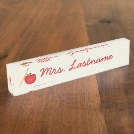 Apfel und gelber Stift und Individuelle Name aus r Namensplakette