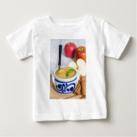 Applesauce with cinnamon in stoneware bowl