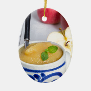 Applesauce with cinnamon in stoneware bowl keramikornament