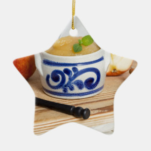 Applesauce with cinnamon in stoneware bowl keramikornament