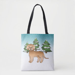 Apricot Mini Goldendoodle Hund in einem Winterwald Tasche