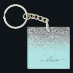 Aqua Blue Aquamarin Silver Glitzer Monogram Schlüsselanhänger<br><div class="desc">Aqua Blue - Aquamarine und Silberne Imitate Foil Sparkle Glitzer Script Monogram Name Schlüsselanhänger. Das macht den perfekten 16 Geburtstag,  Hochzeit,  Brautparty,  Jubiläum,  Babydusche oder Junggeselinnen-Abschied Geschenk für jemanden,  der Lieben glamourösen Luxus und schicke Stile.</div>