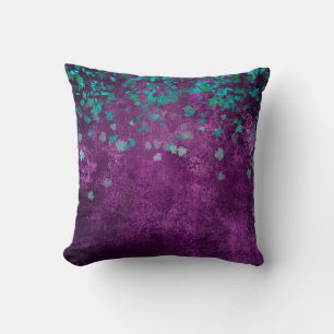 Aquamarin Confetti auf Lila Kissen