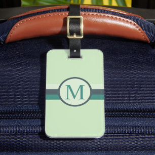 Aquamariner, heller, blauer Farbblock mit  hellwei Gepäckanhänger