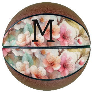 Aquarell-Monogramm mit rosa Kirschblüten Basketball