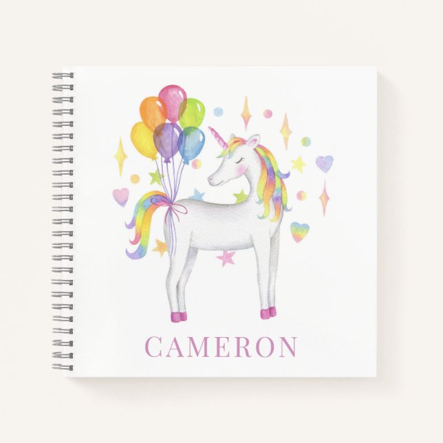 Aquarellfarbenes Regenbogenfarben Einhorn mit Ball Notizbuch (Vorderseite)