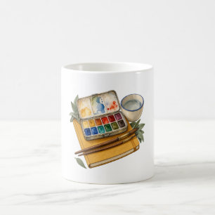 Aquarellfarbenpalette und Pinsel Künstler Tasse
