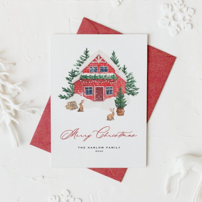 Aquarellrote Hütte im Schneewald Weihnachten (Send warm wishes with this watercolor Christmas card featuring a charming red cottage.)