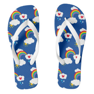 Arc-en-ciel, nuages, pluie et tongs solaires