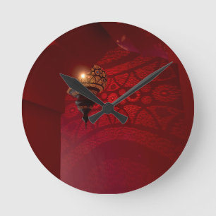 Arched entrance and illuminated lantern runde wanduhr