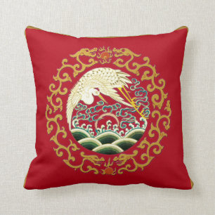 Art asiatique d'oiseau sur le coussin rouge-foncé