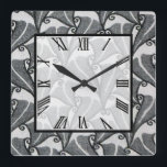 Art-Deco-Blätter Quadratische Wanduhr<br><div class="desc">10, 75" x 10, 75" Acrylwandtüte mit einem Bild eines wunderschönen Art Deco Schwarz-Weiß-Blattes. Der weiße,  transparente Platz hat eine römische Ziffernuhr und eine schwarze Grenze. Sehen Sie sich die gesamte Roaring 20s Clock-Sammlung im DECOR an. | Uhrenabschnitt.</div>