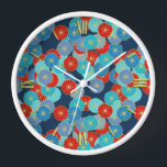 Art Deco Blume - blau, türkis und rot Uhr<br><div class="desc">Ein Art-Deco-Muster,  das auf einem traditionellen,  stilisierten Chrysanthemum-Muster basiert,  das in japanischen Textilien verwendet wird,  in den Farben blau,  türkis und hell rot,  in Gold,  auf dunkelblauem Hintergrund</div>