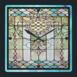 Art Deco Festglas 4 Quadratische Wanduhr<br><div class="desc">10, 75" x 10, 75" Acrylwandtüte mit einem Bild von aufwändigem Art Deco Buntglas in Rosa,  Blau und Grün. Die schwarzen orbs markieren die 12,  3,  6 und 9 positionen. Sehen Sie die gesamte Roaring 20s Clock-Auflistung im DECOR| Kontrollabschnitt.</div>