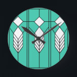 Art Deco Runde Wanduhr<br><div class="desc">This clock has an art deco stained-glass window design of diamonds and lines in white, black, and turquoise.</div>