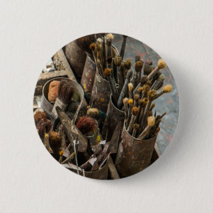 Artist Paintbrushes in Old Rusty Tin Cans Button