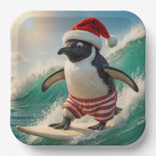 Assiettes En Carton Manchot de Noël surfant sur une vague océanique