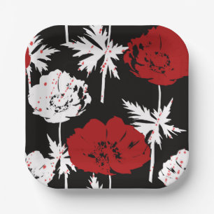 Assiettes En Carton Rouge, fleurs blanches sur noir.