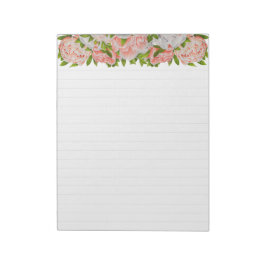 Assortierte Peonies auf einem großen Notepad Notizblock