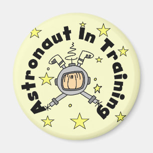 Astronaut in den Trainings-T-Shirts und den Magnet