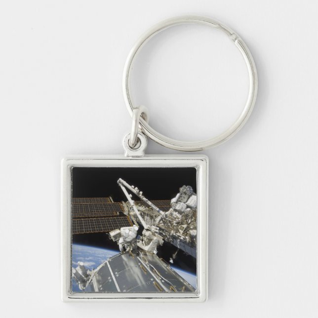 Astronauten erfüllen eine Reihe von Aufgaben Schlüsselanhänger (Vorne)