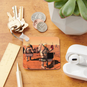 Astronauten richten Wetterausrüstung auf Mars ein. Schlüsselanhänger