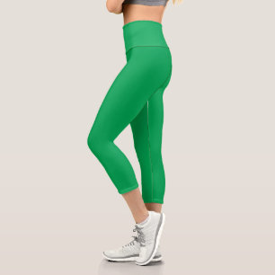 Atemberaubender grüner Hintergrund mit weißem Gren Capri Leggings