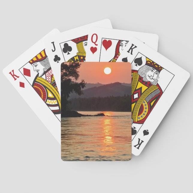 Atemberaubender Sonnenaufgang über dem Foto des Fl Spielkarten (Rückseite)