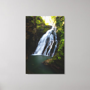 Atemberaubender Wasserfall mit Sonnenlicht Leinwanddruck