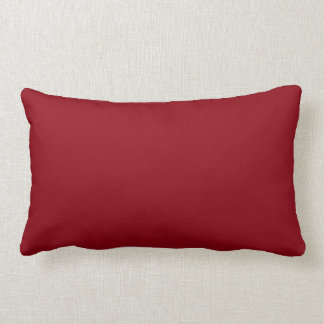 Attaquer sur le coussin lombaire rouge de temps