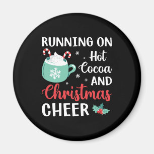 Auf heißem Kakao und Weihnachtsgeschenk laufen Magnet