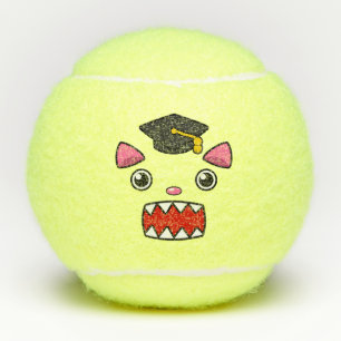 Aufgeregte Abschluss-Katze Tennisbälle