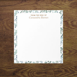 Aus dem Schreibtisch mit blaugrünem Notepad Notizblock