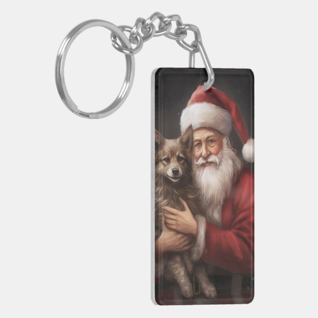 Australian Kelpie mit Weihnachten im Weihnachtsman Schlüsselanhänger (Vorderseite links)