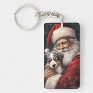 Australian Shepherd avec le Père Noël Noël 