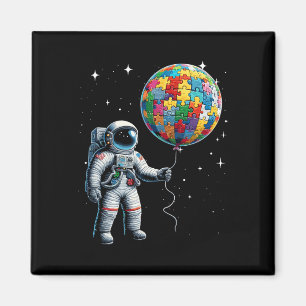 Autismus-Astronaut hält Planet Lloons Autismus-Bew Magnet