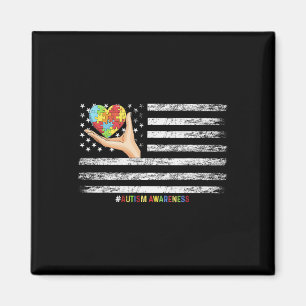 Autismus Bewusstsein US-Flagge Hand mit einer Hefe Magnet