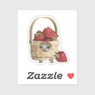 Autocollant de chat dans un panier de fraises