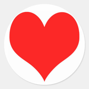 Autocollant rond avec un coeur rouge au milieu