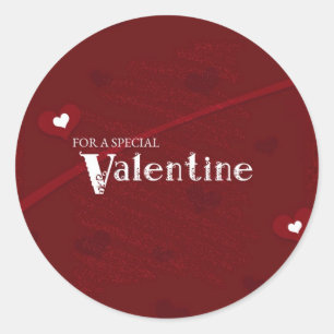 Autocollant rond de Valentine de coeurs rouges et