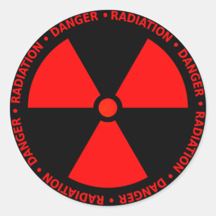 Autocollant rouge de symbole de rayonnement
