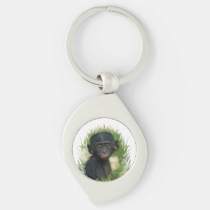 Baby Ape im Gras Schlüsselanhänger