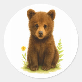 Baby Bear Cub in den Wildblumen Runder Aufkleber