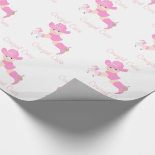 Baby-Cowgirl mit rosa Hut-und Geschenkpapier