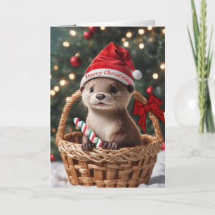 Baby de la loutre de Noël dans une carte de vacanc