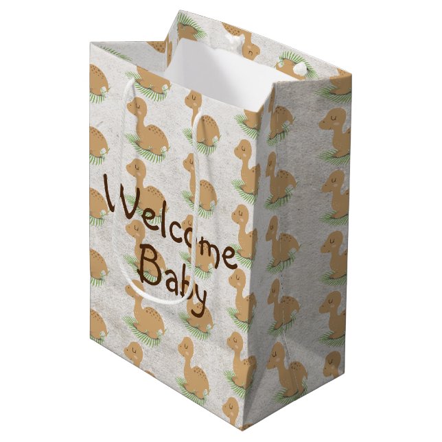 Baby Dinosaurier auf Leaf Babygeschenk Mittlere Geschenktüte (Vorderseite Schrägansicht)