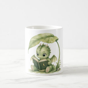 Baby-Drache liest unter einem Blatt-Geschichtenbuc Kaffeetasse